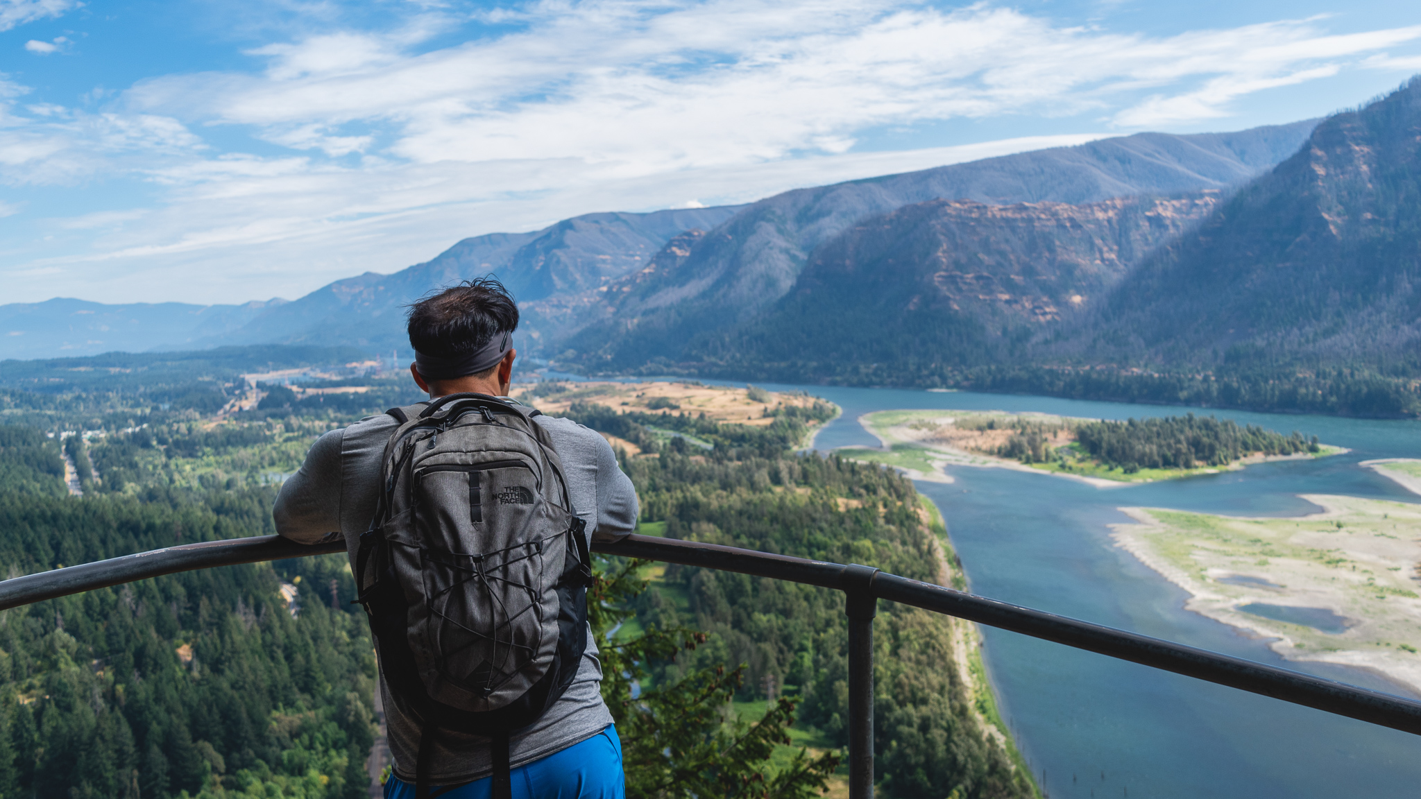 Jay look out at the Columbia River Gorge on our hike to Beacon Rock