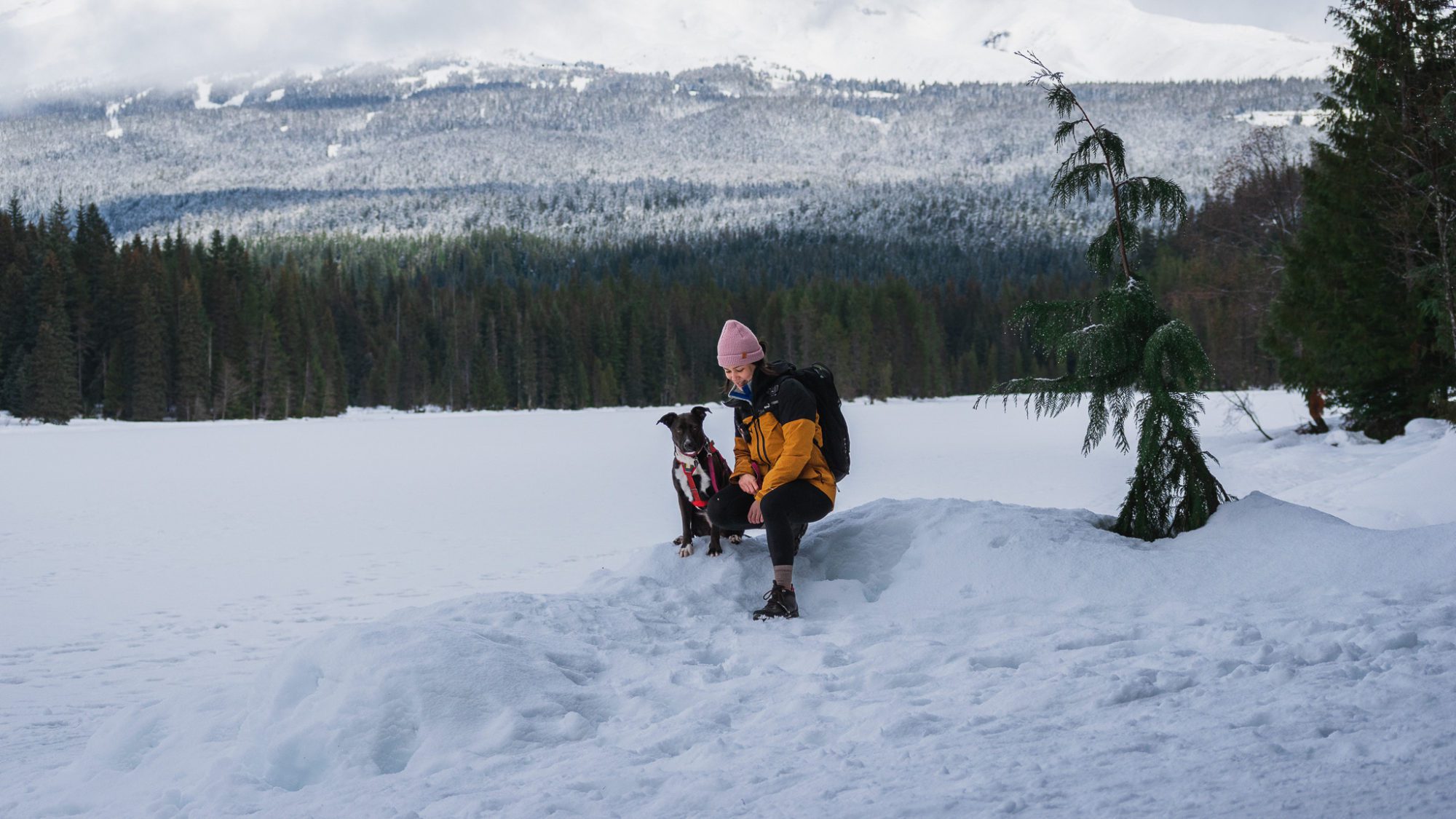 Mia and her dog Zella on a hike at Trillium Lake near Mt. Hood