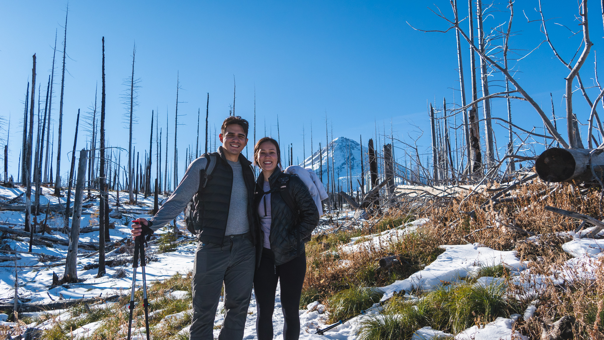 Mia and Jay hiking the Tilly Jane trail to the Tilly Jane A-Frame in the snow