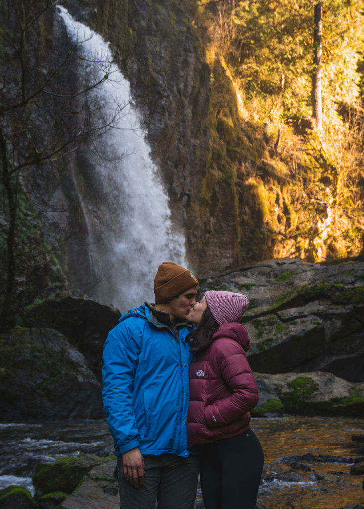 Mia and Jay kissing after hiking to Drift Creek Falls in Oregon